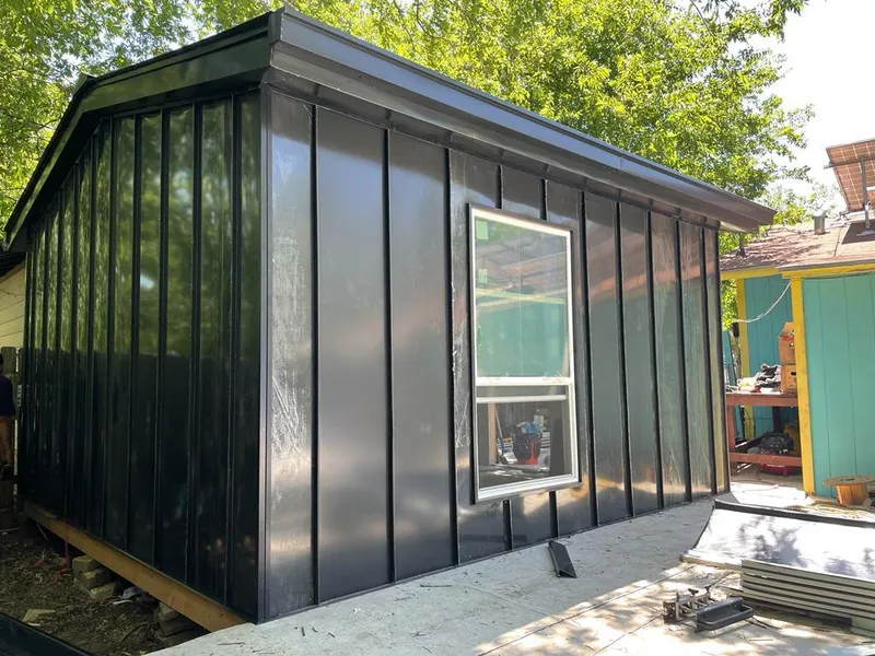 Black standing seam metal wall panels for Metal Roof Installation in Ridgeway