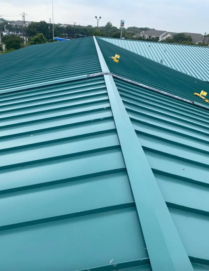 Green commercial metal roof ridge and valley for Metal Roof Repair in Ridgeway